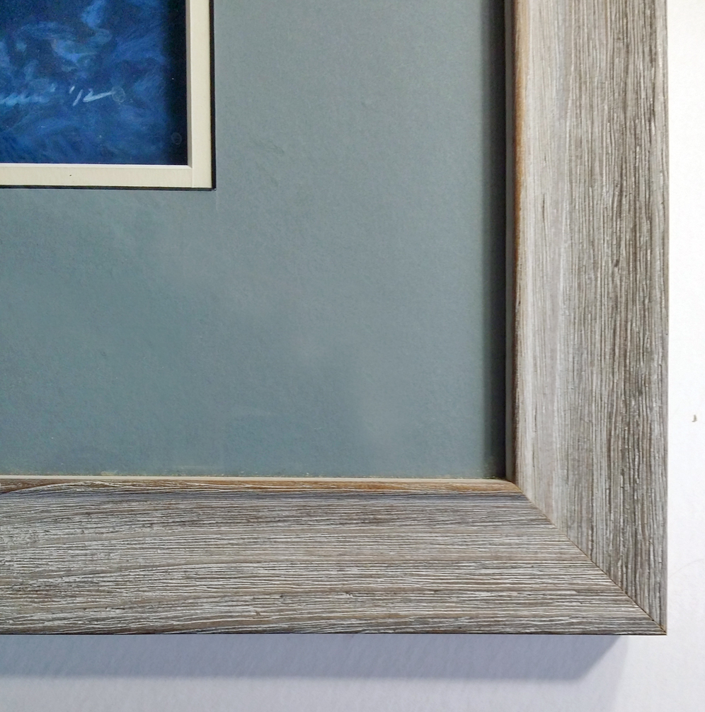 The mat and frame for the original painting.