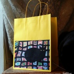Mewsette on the Afghan gift bag, yellow