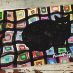 Mewsette on the Afghan, 11 x 17 laminated placemat