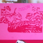 Magenta cards, red ink.