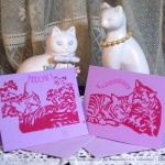Violet cards with red ink, two designs.