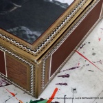Detail on "Waiting for Mom" cigar box keepsake.