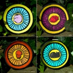 Four colorful trinket dishes.