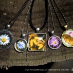 Cabochon Pendants made with photos of wildflowers and butterflies from the trail.