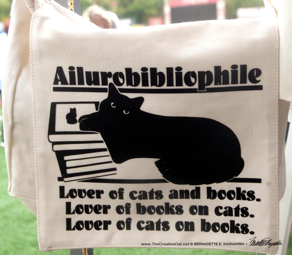 Ailurobibliophile messenger bag style.