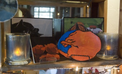 The "orange" display of gift boxes, votives, tiles and dishes.