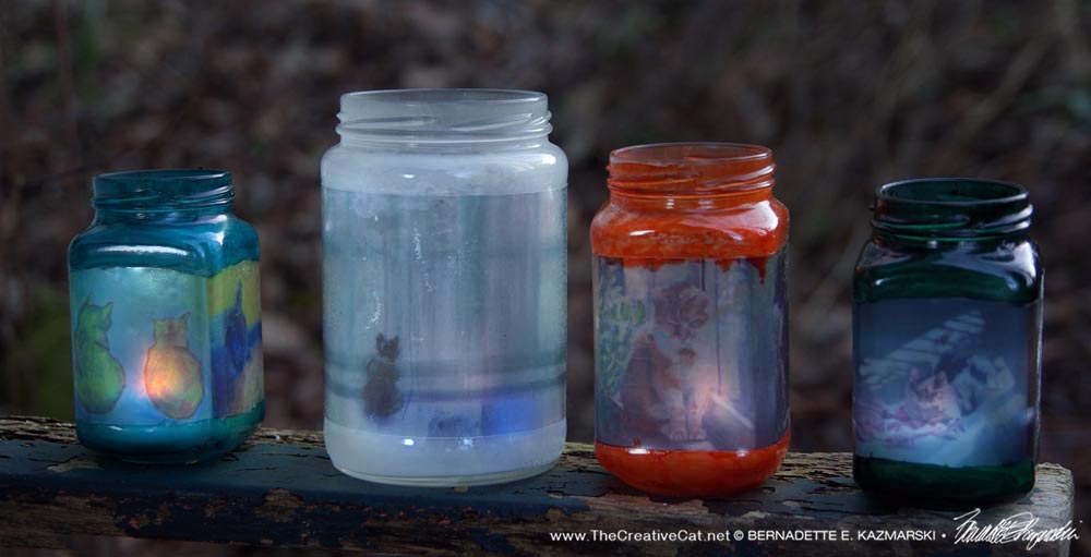 Four new feline votives.