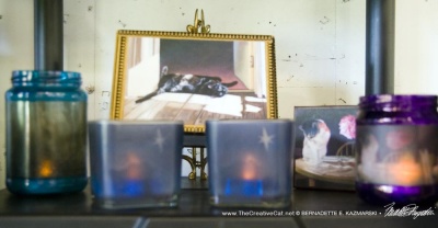The shelf displayed memorial items, but it's a little blurry...