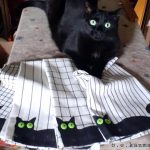 Bella models her dishtowels.