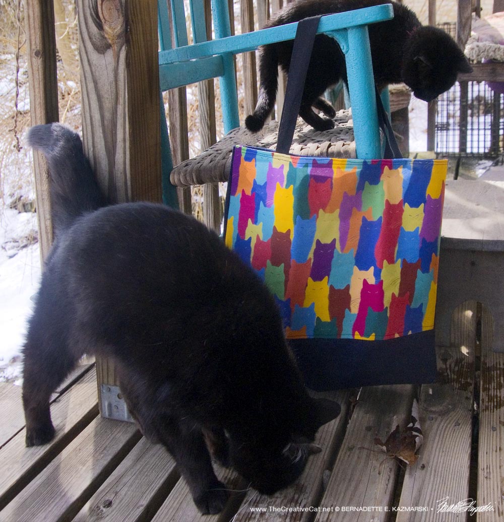 Mewsette and Mimi model the new tote.