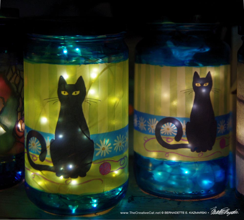 feline votive lamps