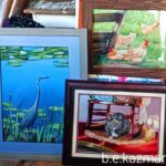 three paintings of animals