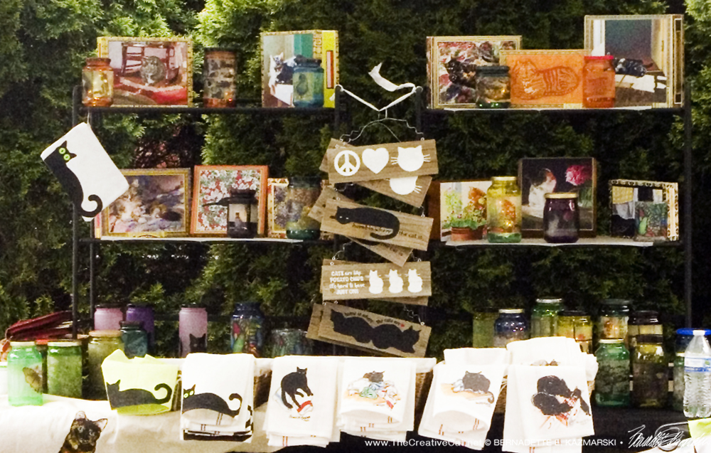 Display of feline-themed gifts.