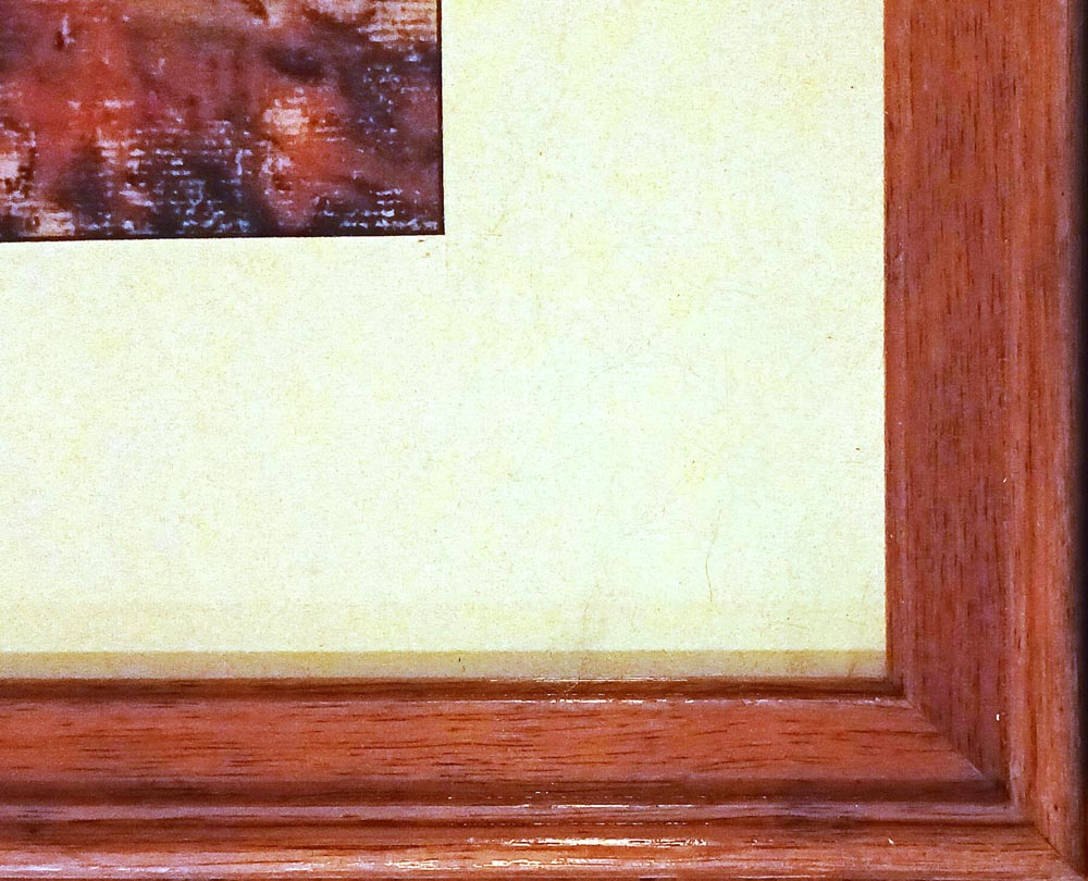 Framed corner of "Safe" print.